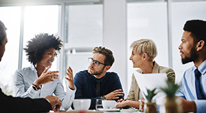 Team of five during a meeting